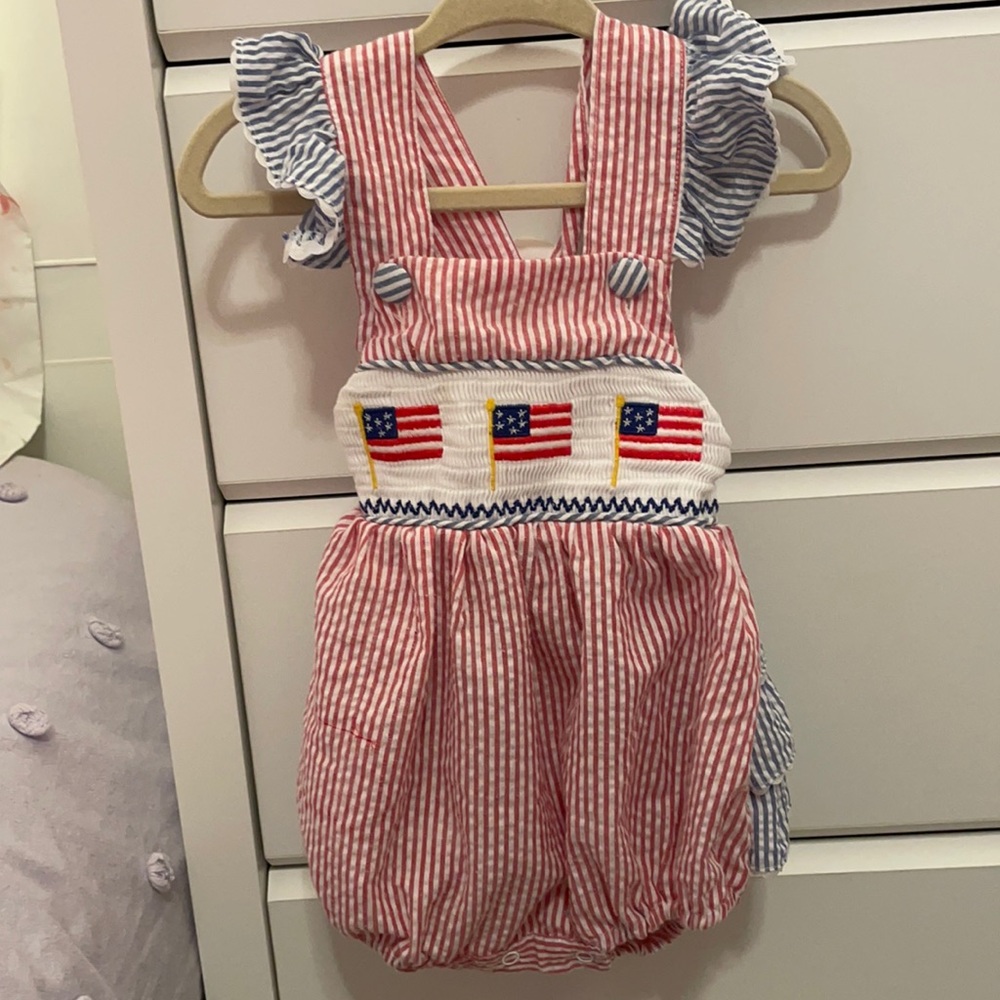 Lil Cactus. Red/blue seersucker smock top with American flags 6-12 mon.